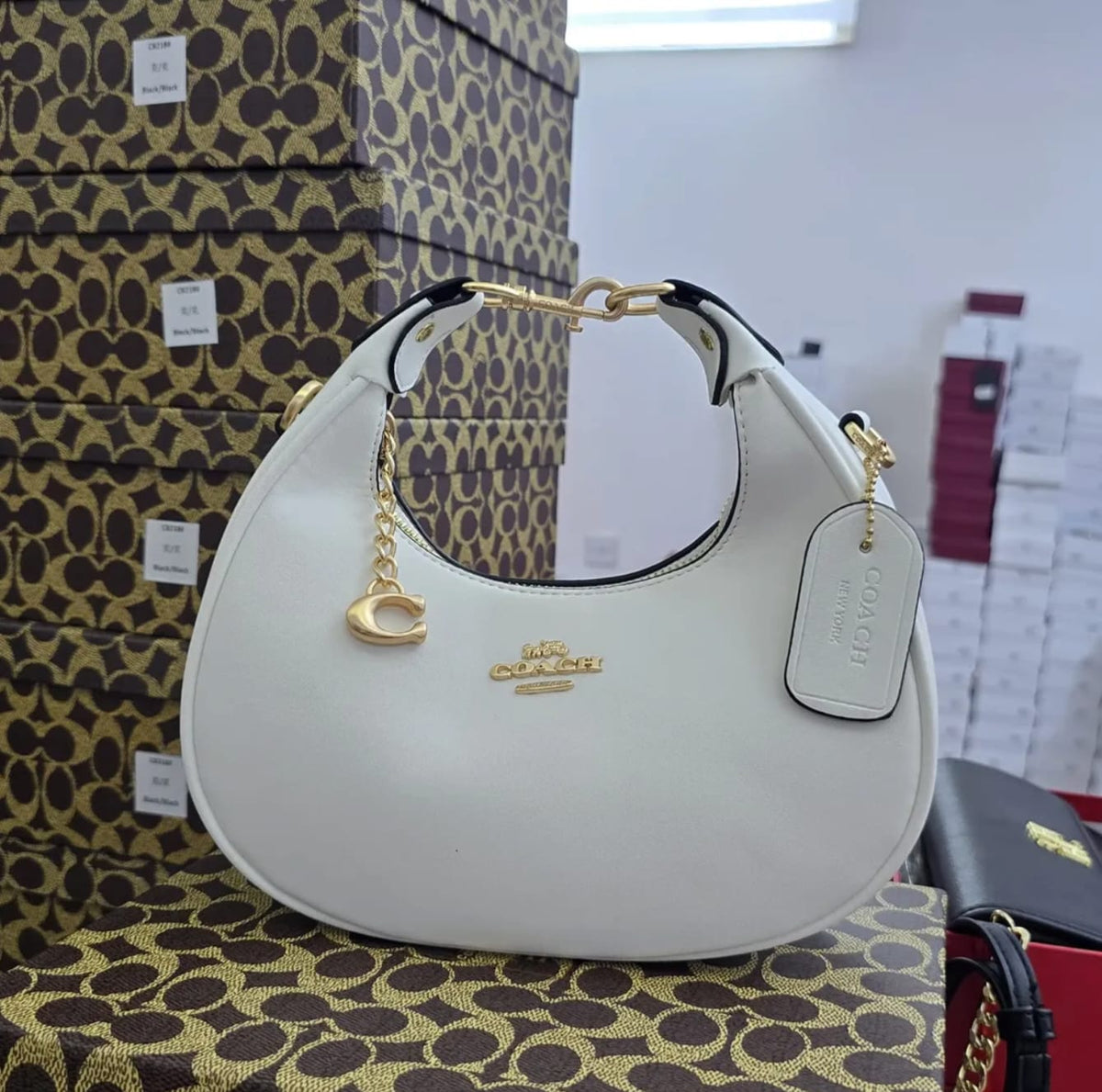 C0ach White Mini Crescent Bag with Glitter Cherry Charm