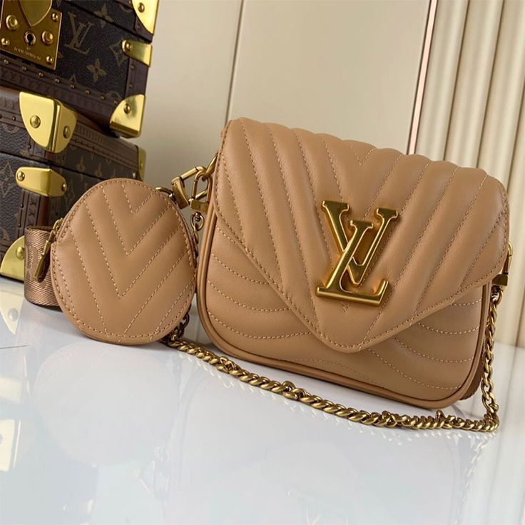 Louis Vui_ton New Wave Multi Pochette in Quilted Leather – Beige/Tan