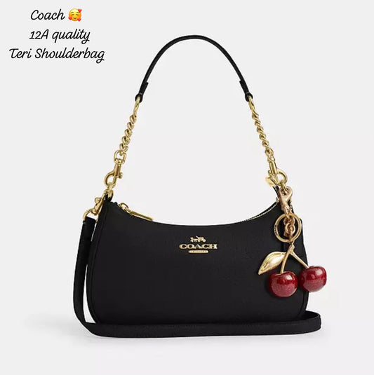Coa_h Teri Shoulder Bag in Black Refined Pebble Leather