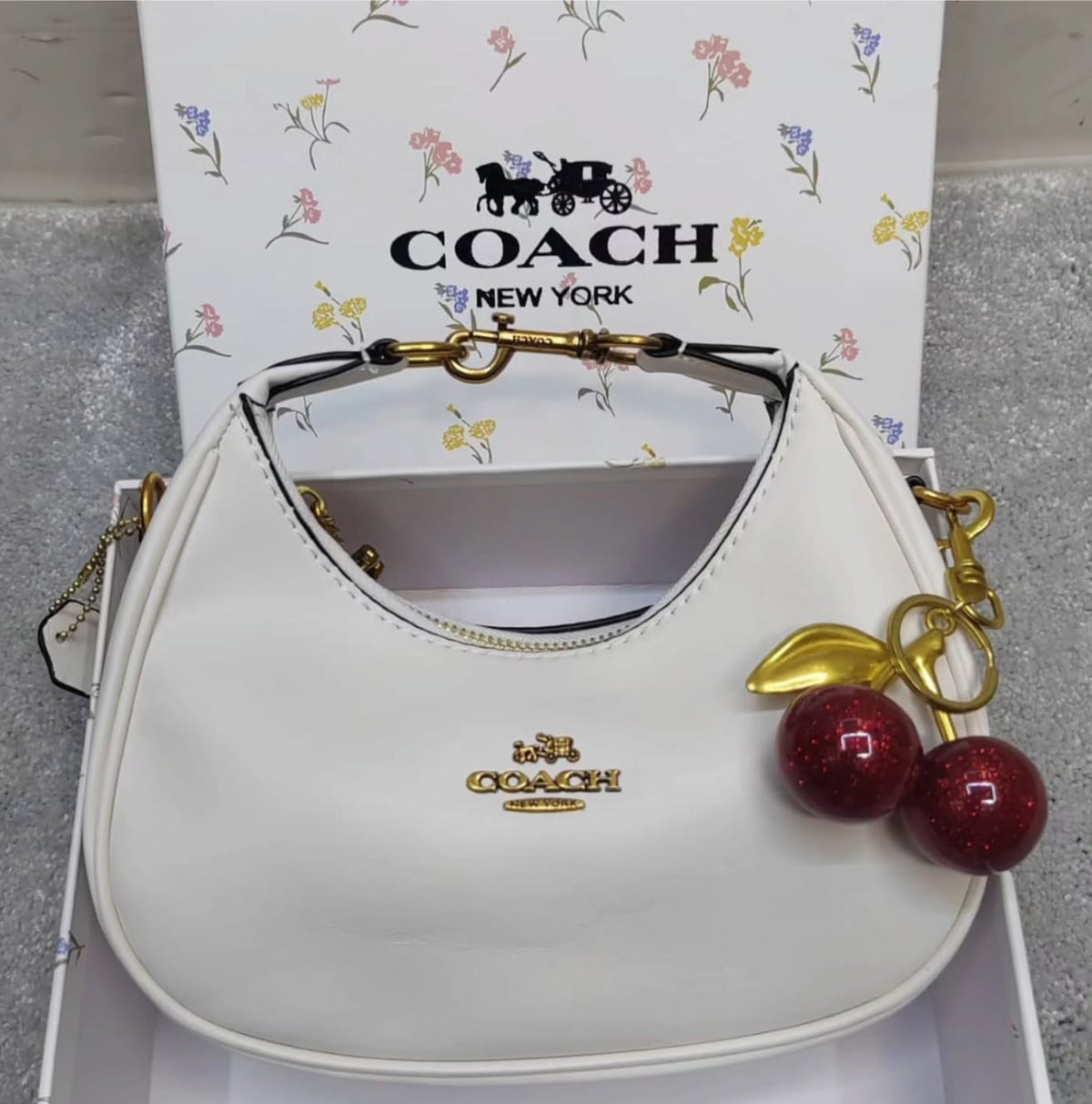 C0ach White Mini Crescent Bag with Glitter Cherry Charm